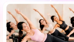 Small group stretching together in a Pilates class